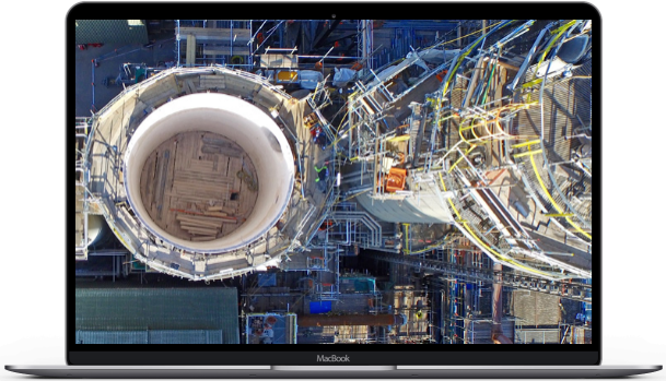 Aerial drone photograph showing inspection of the interior and surroundings of an industrial facility