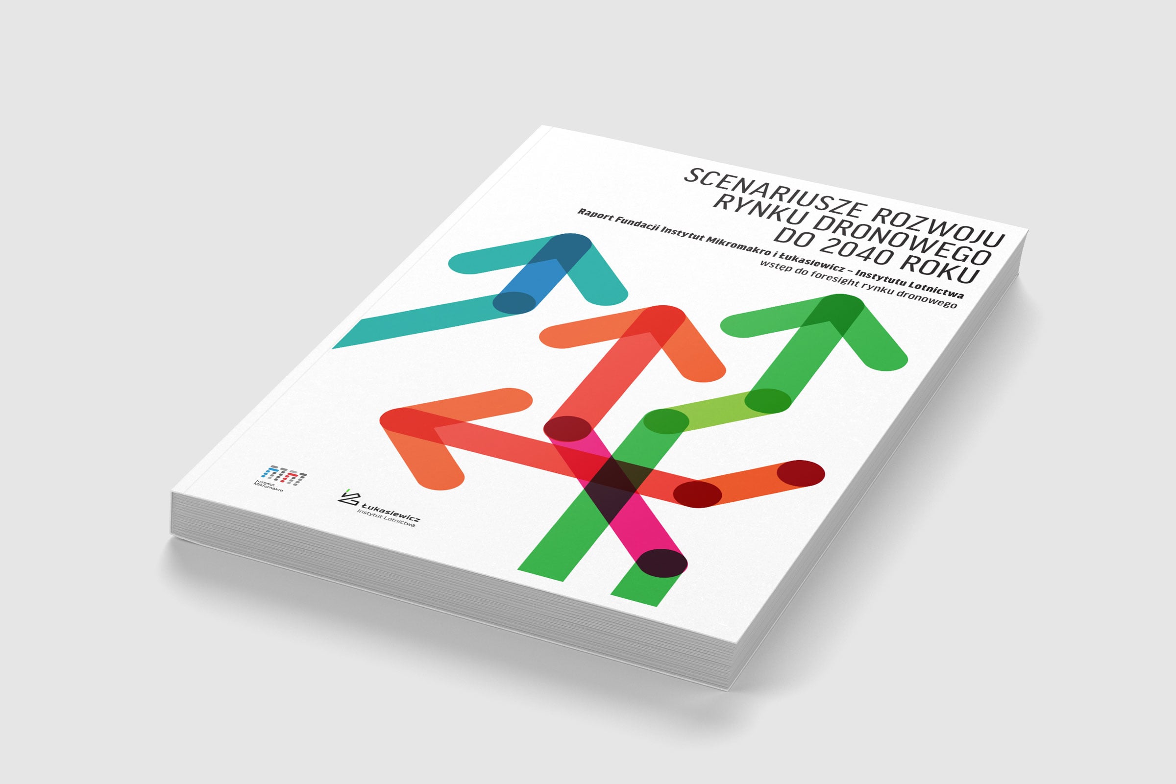 The cover of the report 'Drone Market Development Scenarios to 2040' with colored arrows in different directions, lying at an angle on a white background